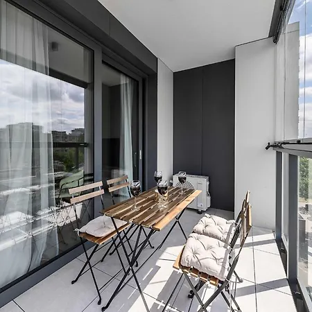Family With Balcony In Apartment